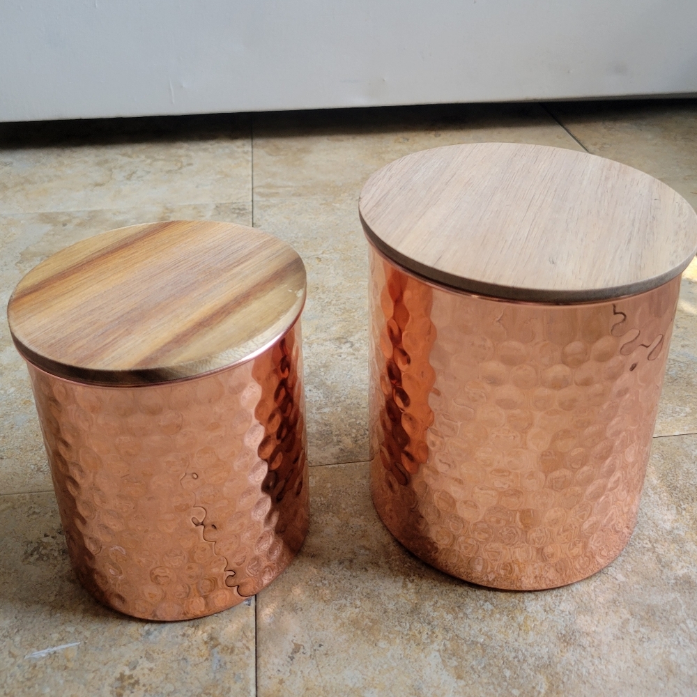 Set of bronze tins with wooden lids